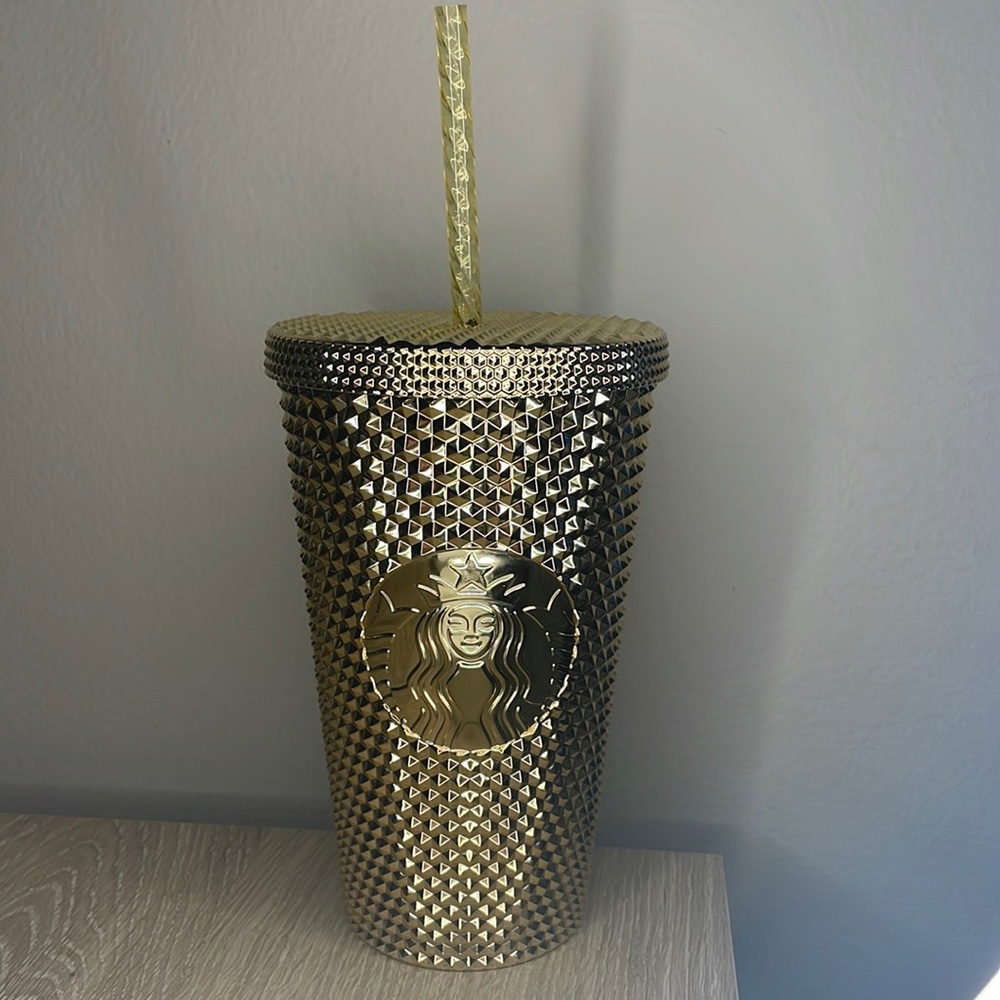 Gold studded Starbucks cup 2022